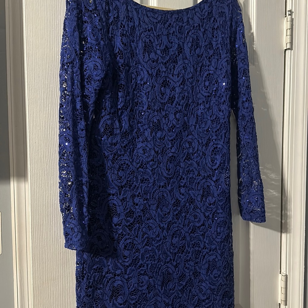 A blue cocktail sequin dress with a lining.